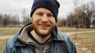 Photo of young man dressed for the cold.