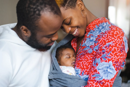 HLT-mother-father-with-baby
